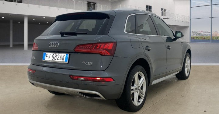 Audi Q5 40 2.0 tdi Business Sport quattro 190cv s-troni Garanzia 12 mesi.✅ Chilometraggio certificati ✅ Fatturabile iva esposta ✅Consegna in tutta Italia.Motore e cambio in ottime condizioni,Clima automatico, cruiser control, rimessa in carreggiata,anti